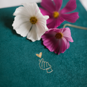 Tradycyjny album na zdjęcia - Turkusowy ze złotą grafiką